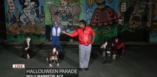 Keith Kaiser watches a dance to a Michael Jackson favorite