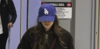 Elizabeth Olsen Just Arrived at the Airport in the Shoe Trend That’s so Mary-Kate and Ashley Coded