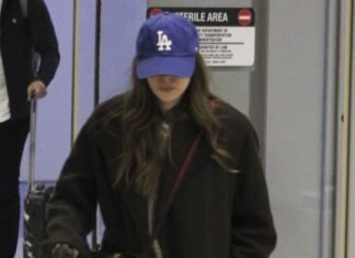 Elizabeth Olsen Just Arrived at the Airport in the Shoe Trend That’s so Mary-Kate and Ashley Coded