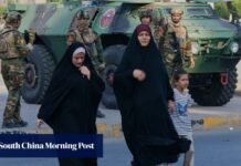 Iraq voters turn out in numbers as region watches on