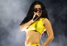 Charli XCX Gives Us A Peek Behind The ‘Brat’ Curtain In ‘The Moment’
