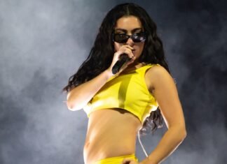 Charli XCX Gives Us A Peek Behind The ‘Brat’ Curtain In ‘The Moment’