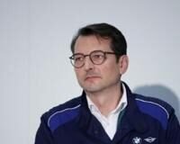 BMW names new boss to steer car giant in tough times
