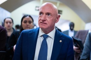 Mark Kelly on taxing AI companies that kill jobs, data center revolts