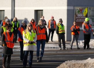 Parents stand watch for ICE outside Minnesota schools