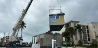 “It’s our home again”: Family watches replica of lost Fort Myers Beach house rise after Ian