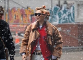 Bella Hadid Mixes Downtown Gorpcore with Grandma Glamour—Rollers and All