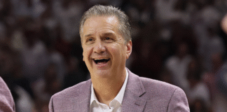 Arkansas’ John Calipari watches 5-star SG Jordan Smith Jr. Thursday night
