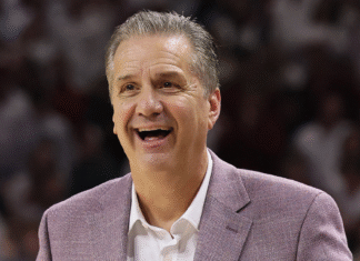 Arkansas’ John Calipari watches 5-star SG Jordan Smith Jr. Thursday night