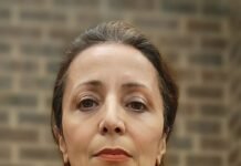 Troy woman watches Iranian protests, crackdowns from afar