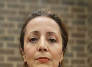 Troy woman watches Iranian protests, crackdowns from afar