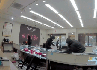 Video shows masked robbers crash car through jewelry store entrance, steal owner’s gun in brazen heist