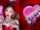 Swarovski’s New Valentine’s Day Collection With Ariana Grande Features Maximalist Charms Your Date-Night Look Needs