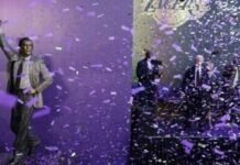 Former head coach Pat Riley watches as the Los Angeles Lakers unveil his statue outside Crypto.com Arena