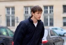 Harris Dickinson Hops Aboard the Bag Boy Trend