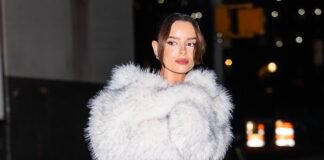 Maura Higgins turns heads in a wild fur-trim corset dress as she adds to her designer handbag collection with a box fresh £17,000 Hermès Birkin on New York trip
