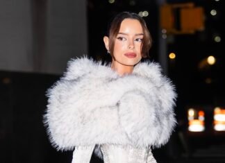 Maura Higgins turns heads in a wild fur-trim corset dress as she adds to her designer handbag collection with a box fresh £17,000 Hermès Birkin on New York trip