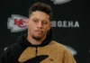 The Chiefs let one of their stars go, and Patrick Mahomes watches from afar as he makes history