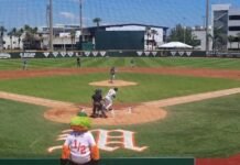 The maniac watches as the Canes clinch the series victory for the second straight day with a 15-5 win by the 10-run rule.
