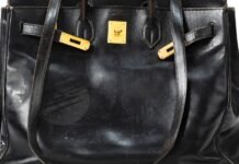 Why worn-out designer handbags are the ultimate status symbols