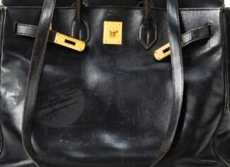 Why worn-out designer handbags are the ultimate status symbols