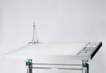 CALIPER and the bespoke worktable created for Daniel Arsham