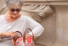 9 things every boomer grandmother has in her handbag at all times that solve problems no one else in the family is prepared for and at least one of them is a tissue that’s been in there since 2019
