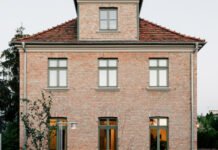 Wiercinski Studio designs bespoke, industrial-style furniture for renovation of historic villa