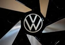 Volkswagen profit drops as carmaker signals further cost cuts