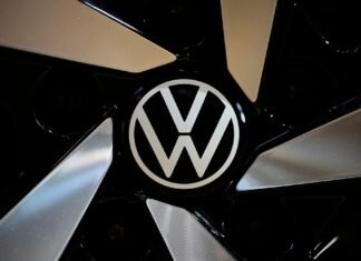 Volkswagen profit drops as carmaker signals further cost cuts
