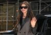 Anne Hathaway Was Spotted Carrying a Royal-Loved Handbag Brand