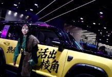 ‘Look, no hands’: China chases the driverless dream at Beijing car show