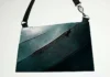 From Fossil to Fashion: Lab-Grown T-Rex Leather Handbag Debuts in Amsterdam