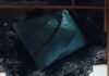 Scientists have created the first ever T-Rex leather handbag with a massive price tag
