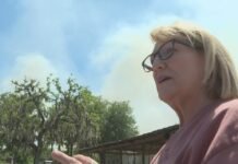 Clay County woman watches as wildfire smoke approaches home