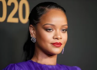 Rihanna sparks debate after feeding cow in India while carrying calf skin Bag