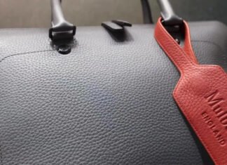 Luxury handbag maker Mulberry returns to sales growth