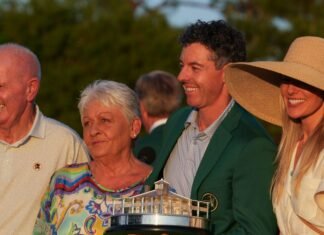 Rory McIlroy’s Mother Spotted With Incredible Custom Handbag At The Masters