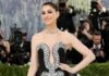 Anne Hathaway Stuns in Hand-Painted Michael Kors Gown Paired with a Bulgari High Jewelry Necklace