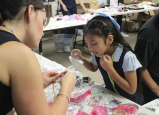 Bonita Springs Elementary students select a piece of jewelry to gift for Mother’s Day