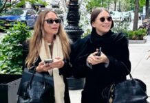 Mary-Kate and Ashley Olsen make a rare appearance wearing coordinated handbags and coats, and serving classic Olsen style