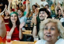 Iran diaspora watches World Cup game with protests, support