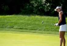 Lexi Thompson, of Delray Beach, Florida, watches her putt during the LPGA Kroger Queen City Championship fourth round at