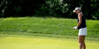 Lexi Thompson, of Delray Beach, Florida, watches her putt during the LPGA Kroger Queen City Championship fourth round at