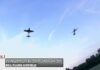 Keith Kaiser watches some RC planes fly in the sky