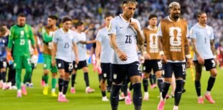 Uruguay struggles in first 2 matches as Suárez watches from the stands