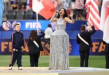Ex-Canadian PM watches World Cup opener in US, not Canada