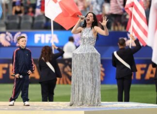 Ex-Canadian PM watches World Cup opener in US, not Canada