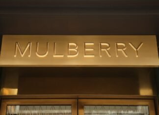 Handbag maker Mulberry cuts losses amid turnaround progress