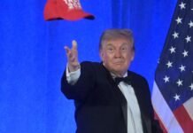 Trump defends his sweeping tariffs and watches ‘America First’ drag races during Michigan stop